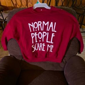 American Horror Story merch. Red “Normal People Scare Me” sweatshirt